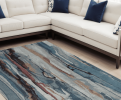 8' X 10' Blue Red And Ivory Wool Abstract Tufted Handmade Stain Resistant Area Rug