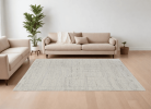 6' X 9' Gray and Ivory Abstract Hand Woven Worn Faded Area Rug