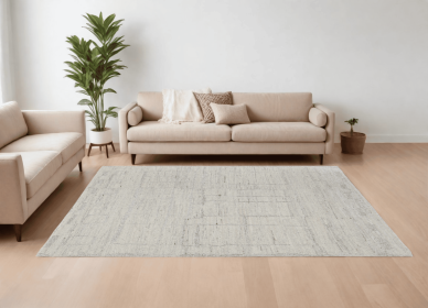 6' X 9' Gray and Ivory Abstract Hand Woven Worn Faded Area Rug