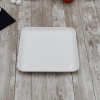 Large feast Charcuterie plating set including long bamboo serving tray and square bamboo platters with fine porcelain plates to match